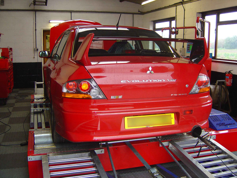 Red Mitsubishi Lancer Evolution on the Corten-Miller rolling road